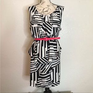 80s style knee length dress with peplum skirt and red belt